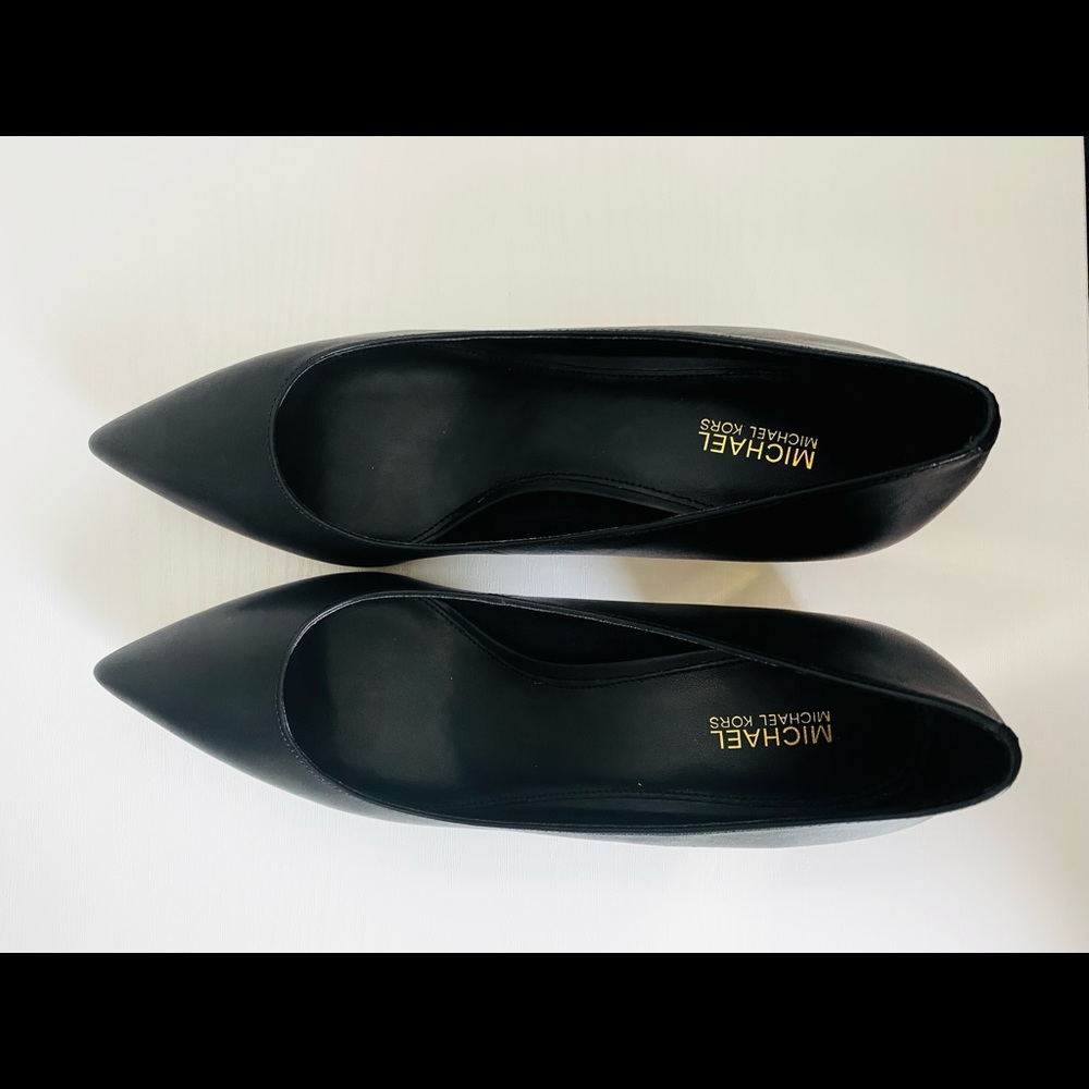 Women designer shoes, unused. Minor stains from storing for a year.